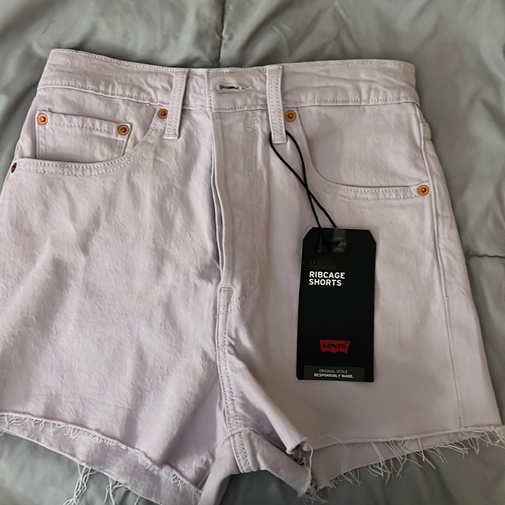 Levi’s 27 waist lavender new tags original price $79.50 never worn. Excellent